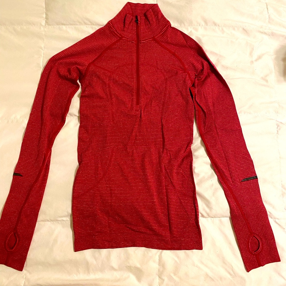 Lululemon red and pink striped pullover.